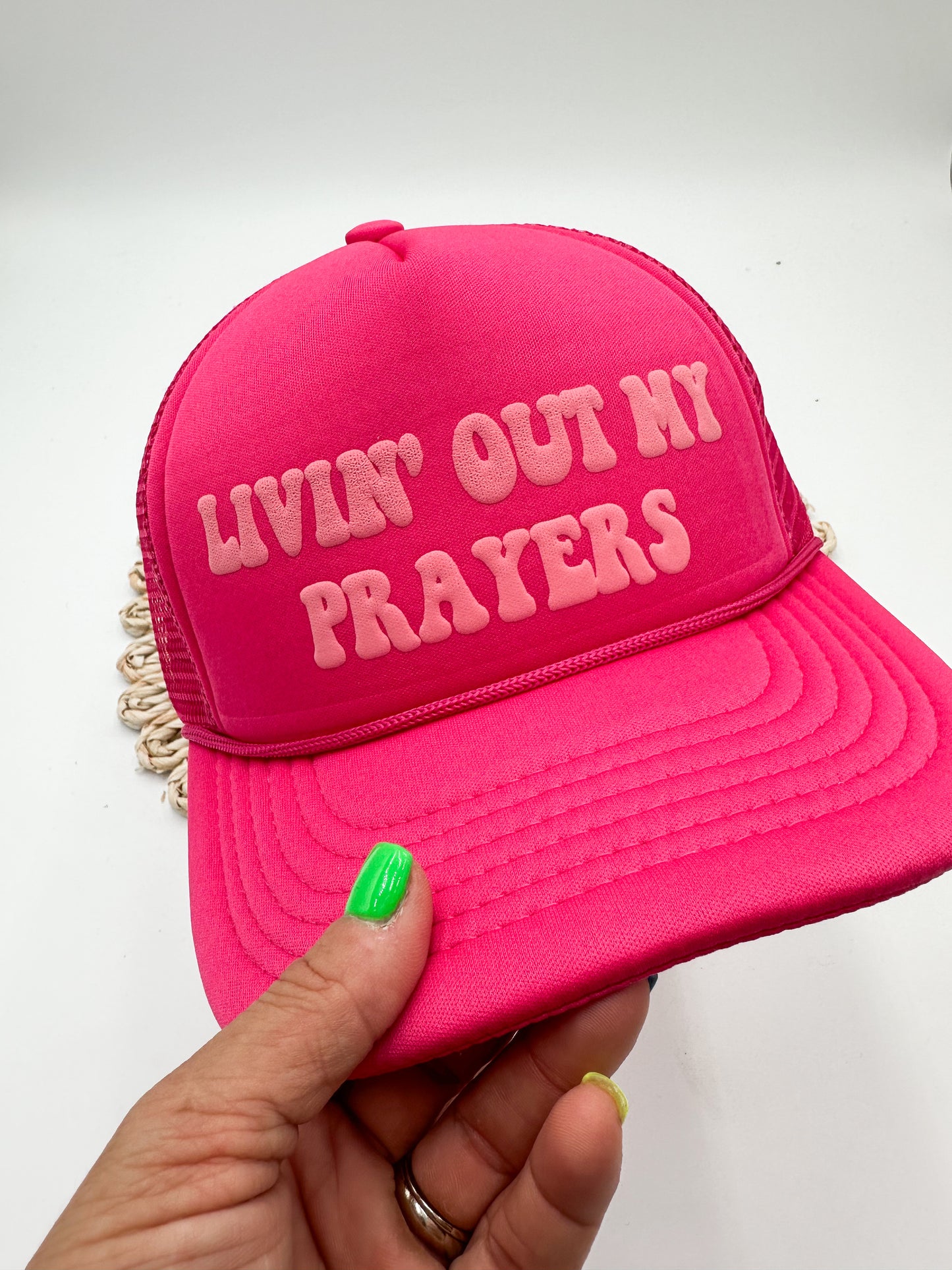Livin’ out my prayers puff printed trucker hat